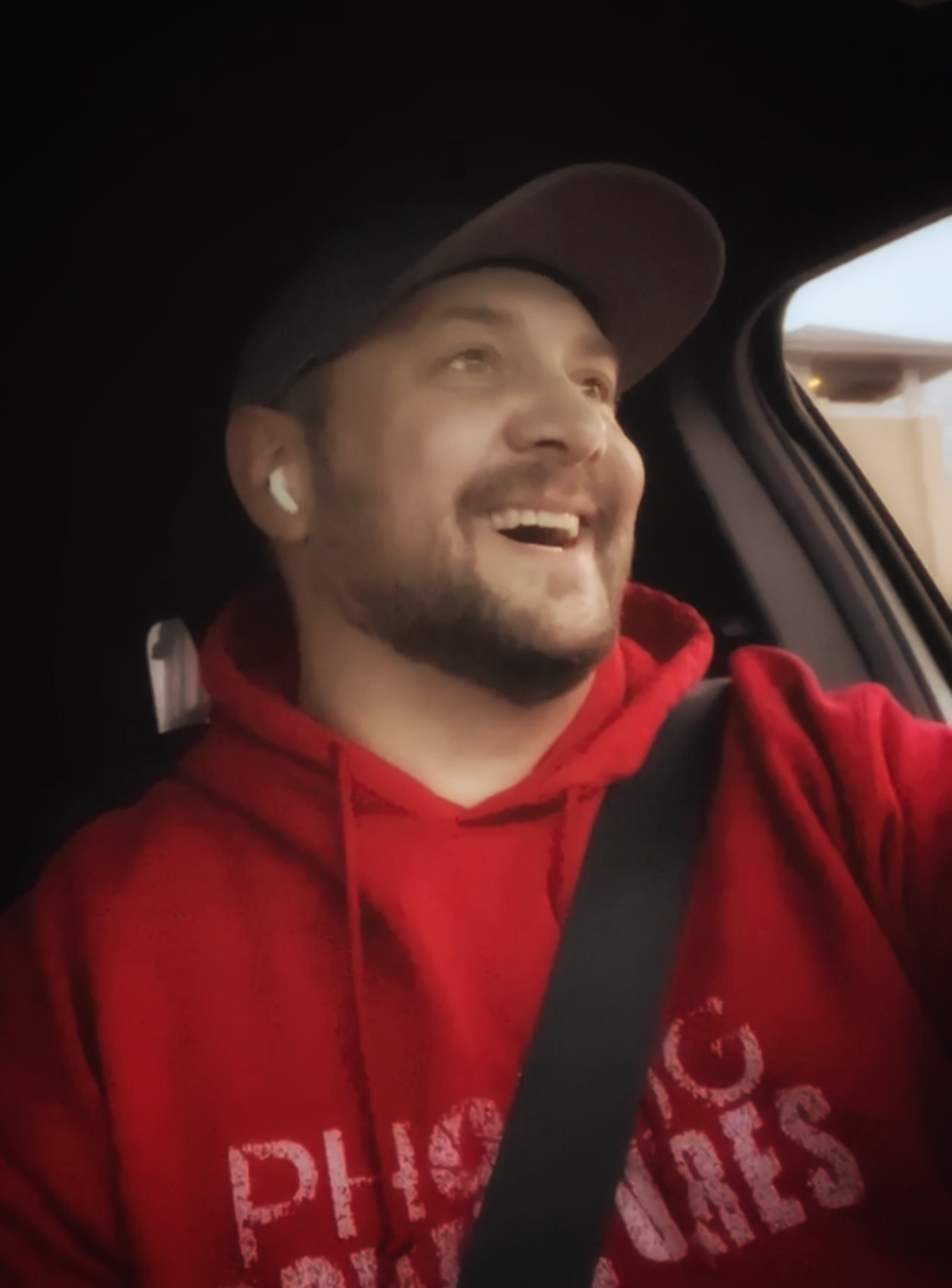 Aaron King under desert light with camera gear